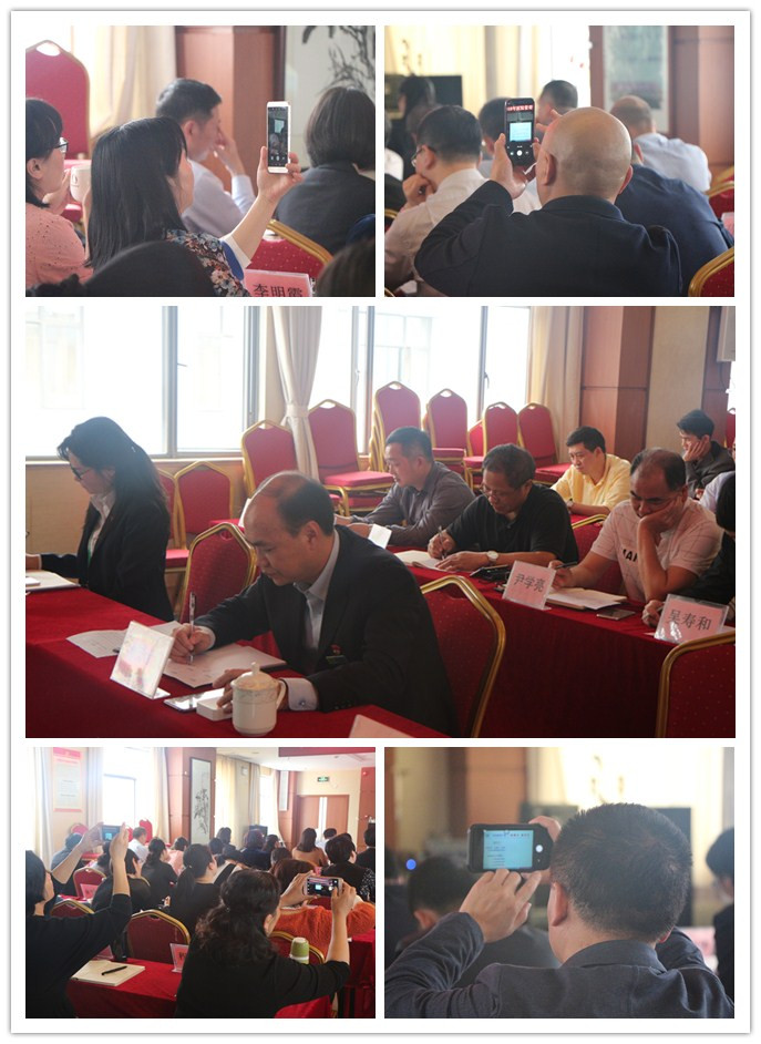 参会同志对新知识如饥似渴，详细记录和纷纷拿起手机拍下.jpg
